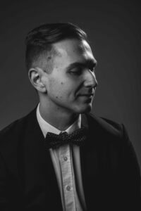 Antti wearing suit. Photo by Toni Pallari